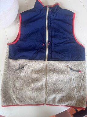 Old Navy  Sherpa Zip-Up Vest navy blue and cream with Coral Trim.
Size small
